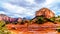 After rain showers, streams and puddles forming at Courthouse Butte, a famous red rock between the Village of Oak Creek and Sedona