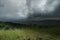 Rain and thunder storm over the forest and lake