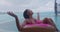 Rain on vacation - funny video of woman unhappy on donut float in luxury pool