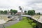 Rain water pumped into river from flood storm retention pond