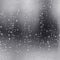 Rain waterdrops on a black dramatic window glass. Autumn  bokeh depression background. Rain pattern