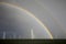 Rainbow above a offshore windpark, Holland