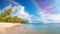 Rainbow above a tranquil beach