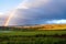 a rainbow appearing after a rainy day