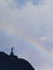 A rainbow appears behind the magnificent statue of Jesus Christ in Tana Toraja, Indonesia