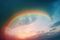 a rainbow appears to be in the sky above a beach and a boat in the water at sunset or sunrise or sunset, with the sun shining