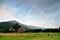 Rainbow arc over the mountain of Gold Coast Hinterland