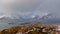 Rainbow at the arctic circle Aerial 4k video over Norwegian fjords after snow storm