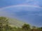 the rainbow behind mountain