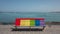 Rainbow bench facing inland in Corralejo, Fuerteventura, Canary Islands, Spain