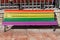 Rainbow bench painted in the colors of LGBT pride flag on Plaza de La Escandalera in Oviedo, Asturias, Spain