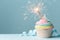 Rainbow birthday cupcake with sparkler