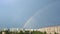 Rainbow on the Blue Sky with Urban House View