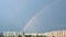 Rainbow on the Blue Sky with Urban House View