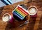 Rainbow Cake with Sprinkles and Cappuccinos