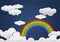 Rainbow and Cloud on Wooden Background