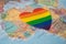 Rainbow color heart on Africa globe world map background, symbol of LGBT pride month  celebrate annual in June social, symbol of