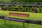 Rainbow colored bench standing in a cemetery