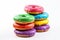 Rainbow Colored Glazed Donuts on white background. AI generative