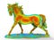 Rainbow colored horse statuette