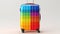 Rainbow colored suitcase isolated on white background