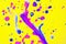 Rainbow drops and streaks of blue and  pink paint on a yellow background. Art image. Abstraction