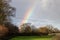 a rainbow in the English countryside