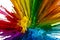 Rainbow explosion celebrates diversity. Vibrant colors burst with meaning.