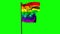 Rainbow flag blowing against green screen