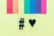 Rainbow flag, hashtag and heart symbols
