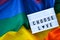 Rainbow flag with lightbox and text CHOOSE LOVE. Rainbow lgbtq flag made from silk material. Symbol of LGBTQ pride month