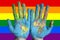 Rainbow flag pattern with hands for LGBT pride for transgender day of memory and transgender
