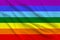 The rainbow flag, the symbol of the international movement for peace on silk, seven colors, located from top to bottom: purple,