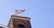 Rainbow flag with the word PACE (Peace in Italian) waving on the tower in Genoa, Italy. Support Ukraine concept