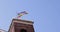 Rainbow flag with the word PACE (Peace in Italian) waving on the tower in Genoa, Italy. Support Ukraine concept