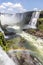 Rainbow, forest, waterfalls and river with rocks