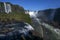 A rainbow forms over the magnificent Iguazu Falls in Brazil.