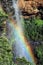 A rainbow forms over Wentworth Falls