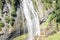 Rainbow forms under Narada Falls