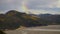 Rainbow forms Wrangell Mountains rainstorm river basin Alaska