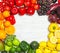 Rainbow frame made of fresh fruits and vegetables