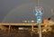 Rainbow with Highway and Interstate Sign in America