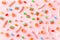 Rainbow juicy gummy candies background. Pattern from jelly sweets on pink background