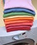 Rainbow laundry on washing machine