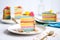 rainbow layered cheesecake slices fan out on plate