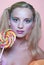 Rainbow makeup and swirl lollipop