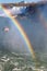 Rainbow near tourist boat at Niagara Falls.