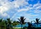 Rainbow off the beach of a resort