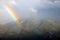 Rainbow over Aletsch glacier and Aletschhorn in the Swiss Alps, Europe