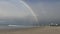 Rainbow over Currumbin headland, Gold Coast, Australia.